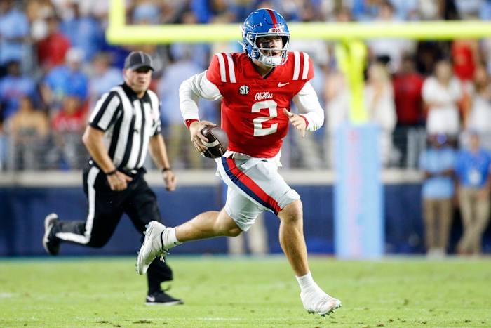 Oct 28, 2023; Oxford, Mississippi, USA; Mississippi Rebels quarterback Jaxson Dart (2) runs the ball during the first half against the Vanderbilt Commodores at Vaught-Hemingway Stadium. Mandatory Credit: Petre Thomas-USA TODAY Sports